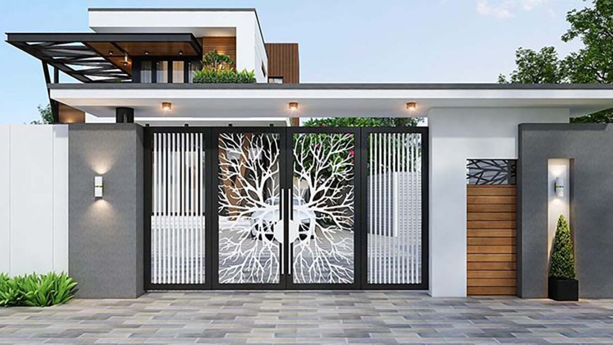 Cổng nhà 4 cánh hiện đại bằng sắt CNC, hoa văn cây cổ thụ độc đáo, thiết kế sang trọng phù hợp biệt thự và nhà phố, mang lại tính thẩm mỹ và phong thủy tốt.